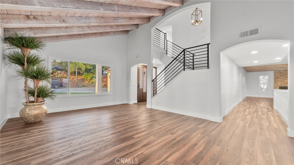 Bright living room remodel with exposed beams